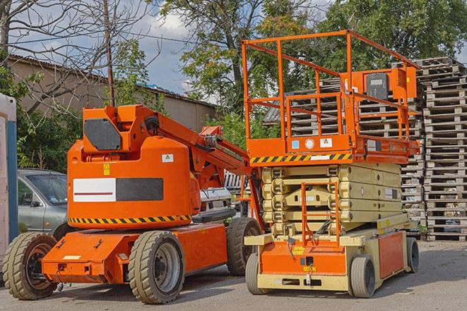 forklift carrying pallets in warehouse in Chatfield OH